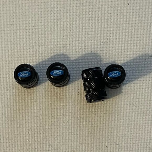 Ford valve Stem caps in Black set of 4 NWT - Picture 1 of 4